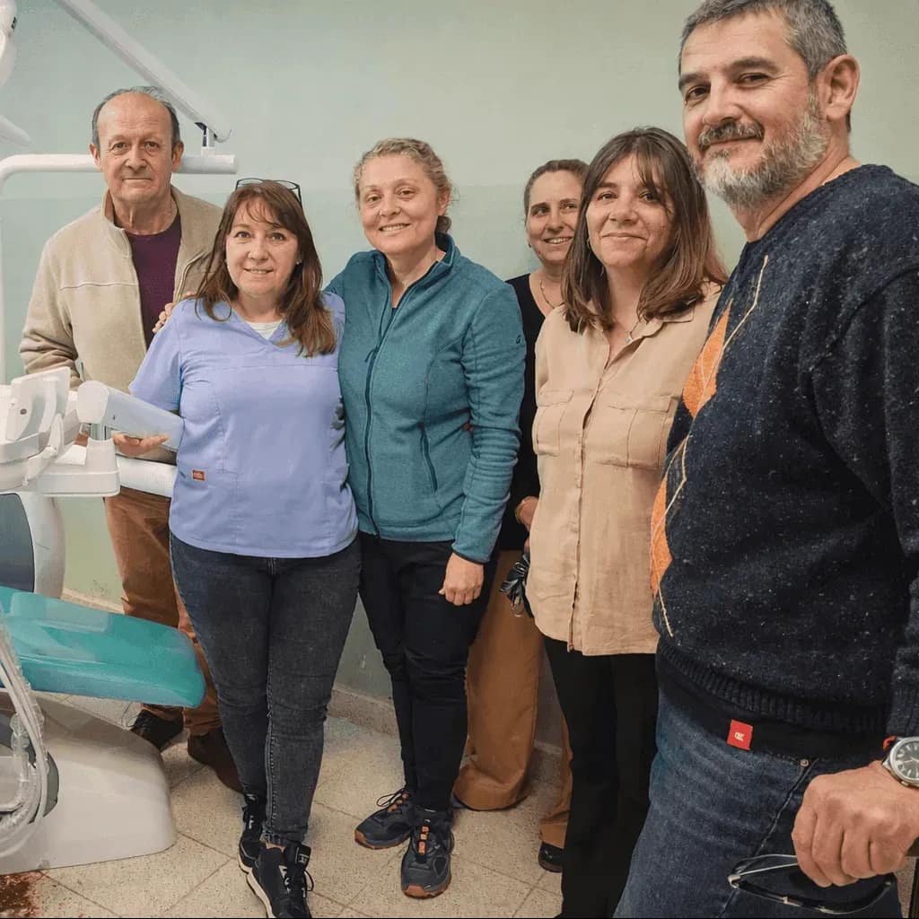 Members of the hospital's support group donating a chair for dentists